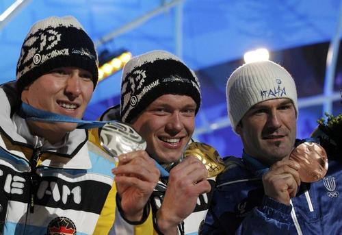 Тройка чемпионов: Давид Меллер (серебро), Феликс Лох (золото) и Армин Цогеллер (бронза)